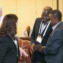 Conference participants from Network Rail chatting with Susan Lubell